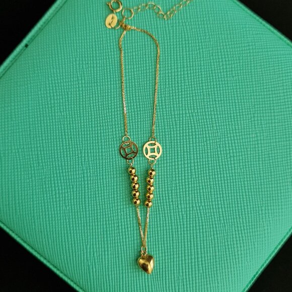 18k Bracelet with small balls and cute money catcher design as charm - Picture 1 of 16